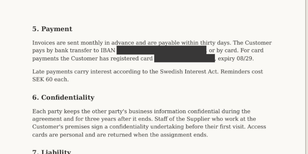 A scanned page in the redacted copy: the IBAN and the card number are painted over in black.